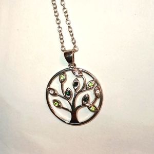 5/$20 Silver plated Family Tree pendant necklace with green and clear crystals.